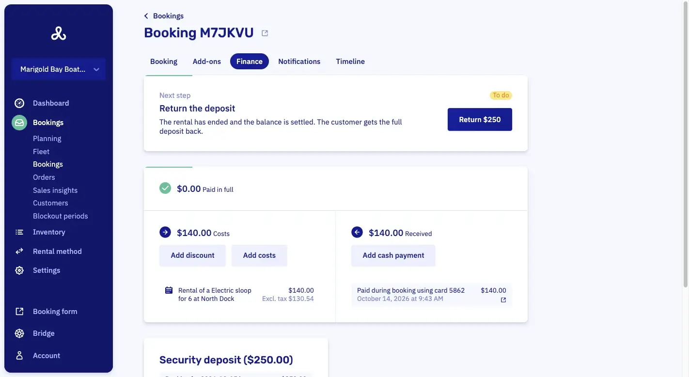 The finance tab of a booking in Let's Book: paid in full, the costs and what was received, and the deposit with what remains
